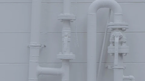 New supply pipes run along a wall
